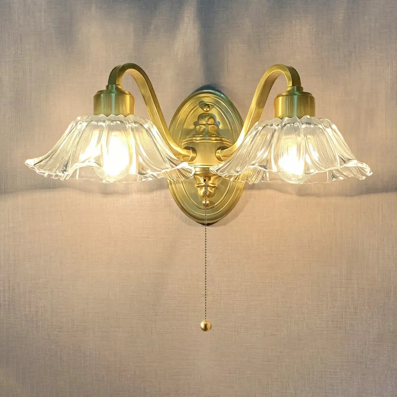 Clear Glass Floral Vanity Light with Gold Arc Arm for Bathroom