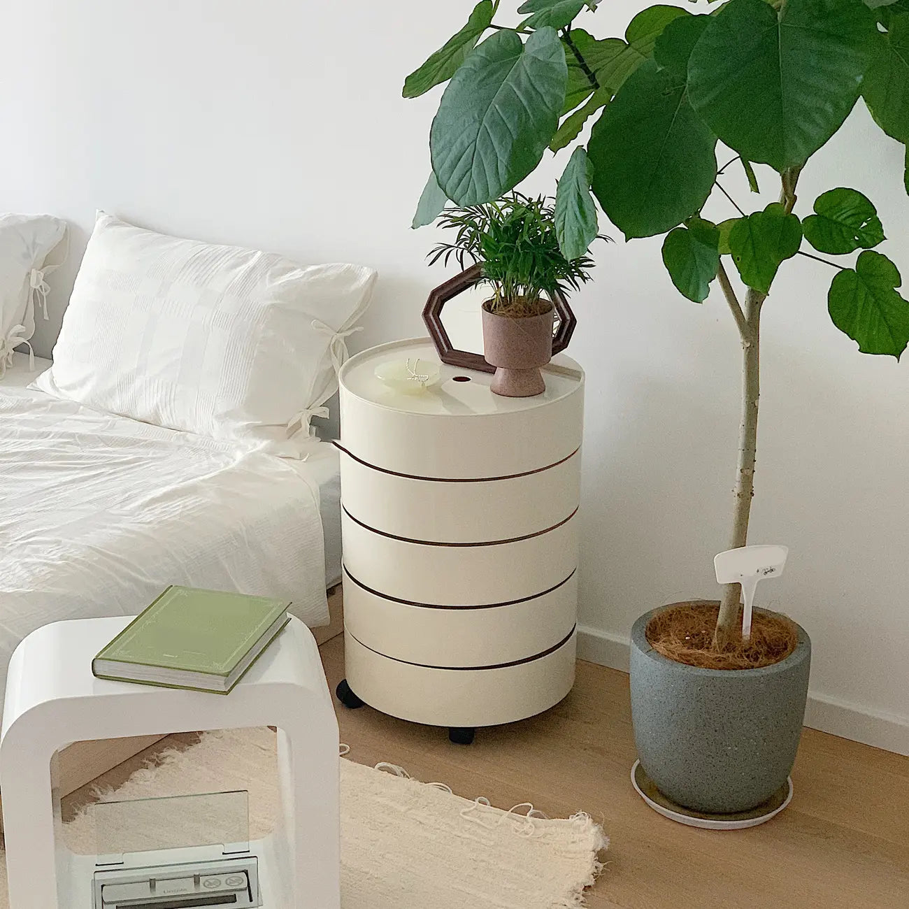 Simple Off White Rotating Bedside Table with Drawers Storage