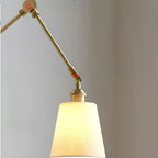 Antique Brass Swing Arm Wall Light with White Ceramics Shade