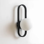 Artistic Brass Wall Sconce with Glass Orb for Living Room
