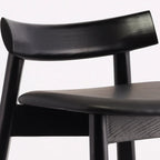 Modern Black Ash Upholstered Saddle Bar Stools