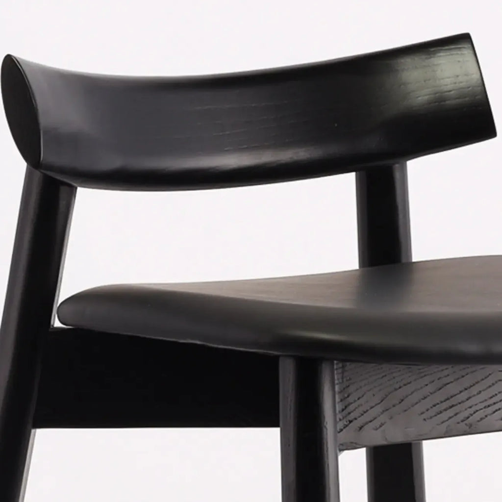 Modern Black Ash Upholstered Saddle Bar Stools