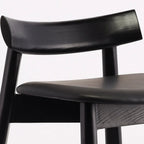 Modern Black Ash Upholstered Saddle Bar Stools