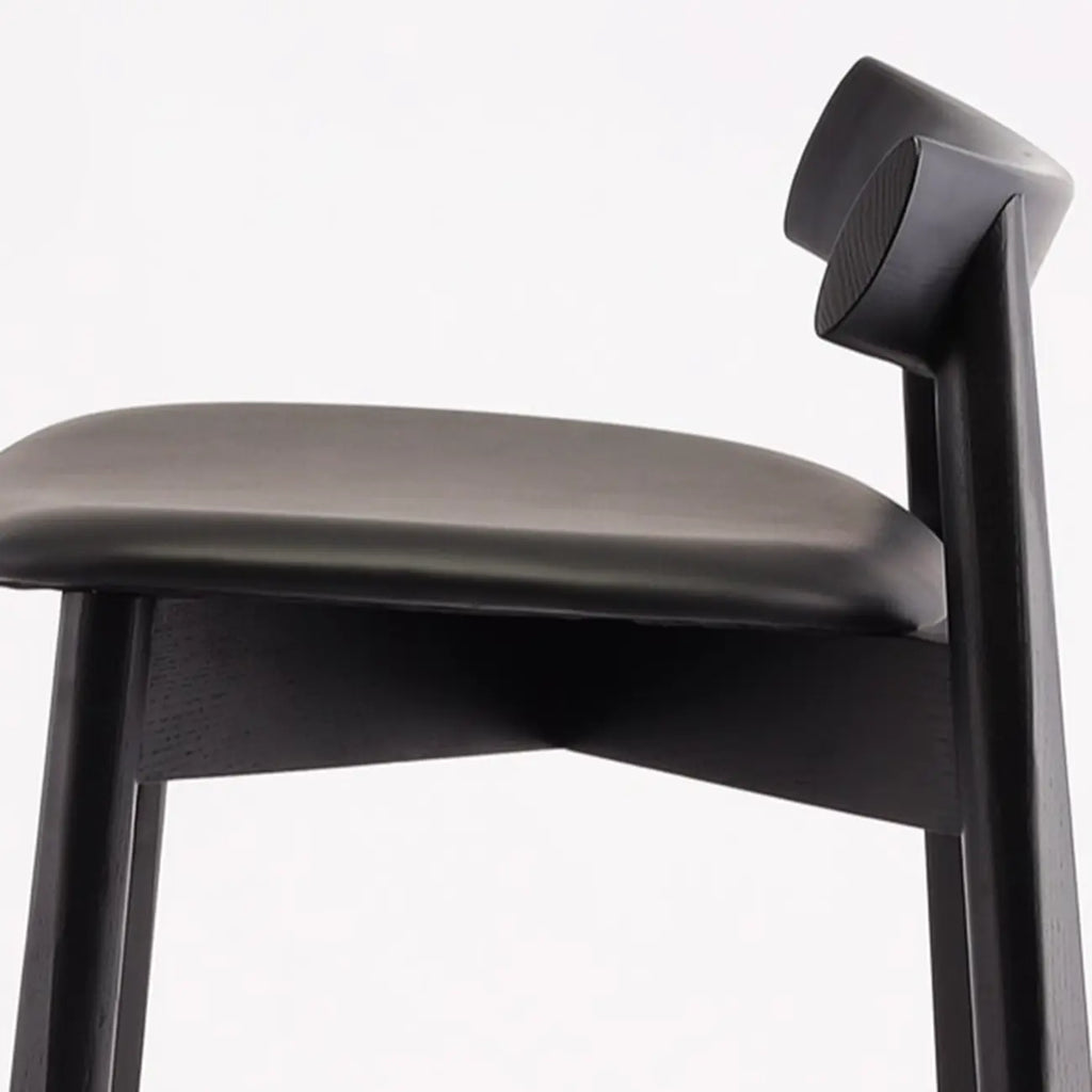 Modern Black Ash Upholstered Saddle Bar Stools