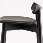 Modern Black Ash Upholstered Saddle Bar Stools