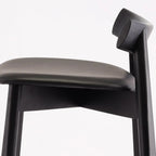 Modern Black Ash Upholstered Saddle Bar Stools