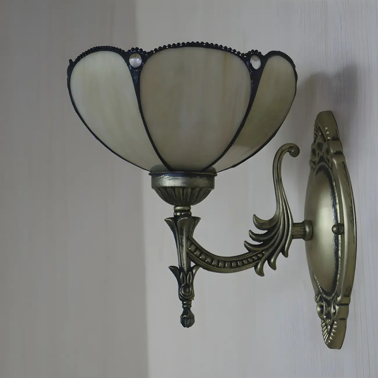 10 to 14 Inch Vintage Brass Wall Sconce with Floral Glass Shade